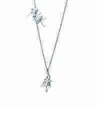 It looks like alice is going to fall down the rabbit hole into wonderland! Down The Rabbit Hole Alice In Wonderland Necklace Out Of Print