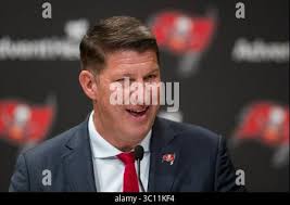 New Tampa Bay Buccaneers general manager Jason Licht smiles during a news  conference Thursday, Jan. 23, 2014, in Tampa, Fla. Licht becomes the fifth  general manager in team history. He takes over