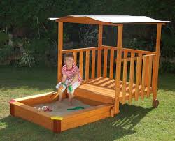 Spielhaus Mit Sandkasten Und Rollenmechanismus Kinderspielhaus 138x136x144cm Ebay Sandkasten Kinderspielhaus Sandkasten Holz