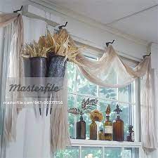Window Treatments Unique Scrim A Net Like Fabric Valance Old Coat Hooks Serve Vintage Window Treatments Unique Window Treatments Kitchen Window Treatments