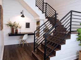 Black wrought iron is a signature characteristic. A Must See Fixer Upper Reno Rustic Barn Doors And A Barn To Go With Them Staircase Decor Farmhouse Staircase Decor Staircase Design