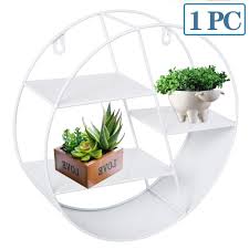 You can find bracket shelves, corner shelves, cube shelves, floating shelves and, organizer shelves that are right for your space and storage needs. Dightyoho Wall Decorative Shelf Round Shelf Metal Circle Wall Unit With Shelves 3 Tier Floating Shelf For Living Room Bedroom Kitchen White Buy Online In Macedonia At Macedonia Desertcart Com Productid 198377976