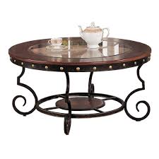 Wrought iron with straightforward geometric designs or gentle curves gives the piece a modern look. Wrought Iron And Glass Coffee Tables Ideas On Foter