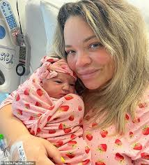 Trisha Paytas welcomes her first child with husband Moses Hacmon...  following bizarre online theory