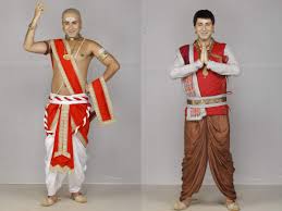 Tenali rama is happy and pointing his finger up. Tenali Rama Krishna Bharadwaj To Play A Dual Role In The Show Shoots For Teaser As Rama Times Of India