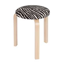 Its top is a canvas of brushed, lacquered, and sanded pine producing surprising color combinations and irregular organic patterns. Artek Stool 60