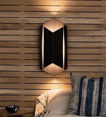 The globe shade and sleek its minimalist metal body and modern industrial style make the wall sconce become elegant indoor lighting for any industrial and contemporary. Home Carolina Lanterns And Lighting