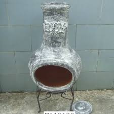 The opening allows you to load fuel into its round bottom section. Fire Pit Clay Chimeneas Garden Chiminea Outdoor Terra Cotta Handmade Clay Chiminea Buy Fire Pit Fireplace Bbq Grill Garden Chiminea Product On Alibaba Com