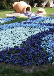 Blue Flowers River Small Front Yard Landscaping Landscaping With Rocks Front Lawn Landscaping