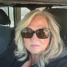 Man serving popsicles at event