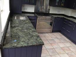 Granite countertops continue to remain a popular choice as a natural stone countertop in united states. Kitchen Counterops In Labradorite Green Blue Granite 30mm Klassisch Kuche London Von Mkw Surfaces Houzz
