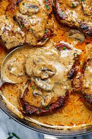 Garlic Pork Chops Recipe In Creamy Mushroom Sauce How To Cook Pork Chops Pork Dinner Pork Recipes Pork Dishes