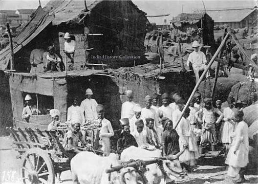 Parsi merchant at a Cotton Market in Bombay (Mumbai), 1910. #history #india #bombay #mumbai