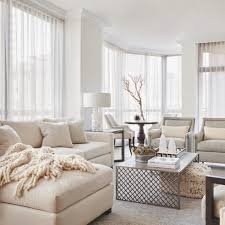 A Condo Gets A Casual Makeover With A Little Bling Luxe Interiors Design Luxe Living Room Home Living Room White