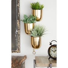 Cherro Metallic Goldtone Hanging Wall Planter Rack By Havenside Home On Sale Overstock 28655007 Modern design ideas are finely offered even with custom styles in shape, size and color to choose from. cherro metallic goldtone hanging wall planter rack by havenside home