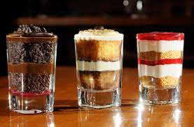 Fill individual glasses half way with cream cheese mixture, either using a spoon or a piping bag fitted with a large round tip for a more polished presentation. Shot Glass Desserts New Restaurant Trend Chattanooga Times Free Press