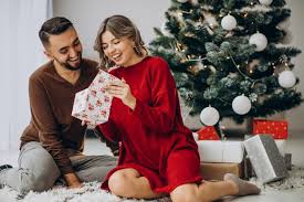 And some guys are still confused 'what to get for her?' phew! Free Photo Couple Celebrating Christmas Together At Home