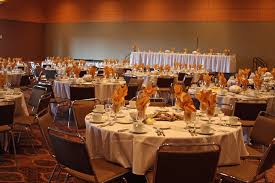 A Clever Bride Used Driftwood And Warm Colors To Achieve A Simple Earthy Look For Her Wedding Simple Trick Run It Thro Banquet Hall Warm Colors Simple Tricks