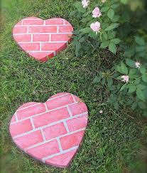 I need stones ,mortar, a good drill bit and rebar. 12 Lovely Diy Stepping Stones For Your Garden Shelterness