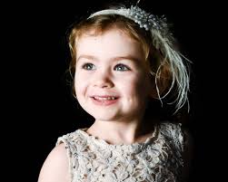 Hi all, my beautiful niece passed away just recently. Would someone be able  to edit one of these photos to give her Angel wings please, maybe clean up  the background etc? It's