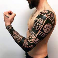 Moreover in most cases the placement of the tattoo decides whether it is a masculine one or a feminine tattoo. 75 Tribal Arm Tattoos For Men Interwoven Line Design Ideas
