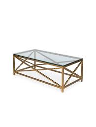 The cleveland glass coffee table by ryan rove combines form and functionality for contemporary interior designs. Cleveland Coffee Table Antique Brass Glass Sarreid 40841