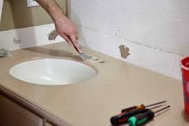 This is the best thing next to new countertops for under $6. How To Refinish Bathroom Vanity Top With Diy Epoxy Resin Thediyplan