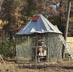 Rustic gazebo made from old chicken coop