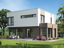 Modernes Haus Design Mit Flachdach Architektur Im Bauhausstil Grosse Fenster Erker Garten Terrasse Einfamilienhaus Baue Einfamilienhaus Haus Modernes Haus