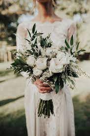 Whoever catches the bouquet is said to be the next to marry. Wedding Traditions Why Brides Carry A Bouquet Modern Wedding