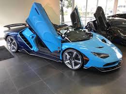 Black And Blue Lamborghini Centenario Lamborghini Centenario Roadster Painted In Blu Cepheus Blu Hera W Bianco Accents And Exposed Car Top Sports Cars Lamborghini Centenario Lamborghini Pictures