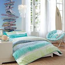 Cool Beach Themed Bedroom For Teenager With Wooden Floor And Matching Blue Chair Charming And Cozy Bed Set Tween Girl Bedroom Girls Room Design Bedroom Themes