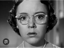 Identify the young lady shown below. She was daughter of a famous director  and appeared in three of his movies.