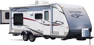 Campground cooking, elevated campfires have become strictly for ambiance thanks to the eagle fifth wheel 319mlok outdoor kitchen—complete with a mini fridge, grill, led lighting and shelving. Jay Feather Ultra Lite Travel Trailers Jayco Inc