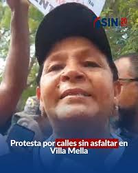 Al asegurar que llevan tres días sin luz, amas de casa de varios sectores  de Villa Mella aseguran que la mañana de hoy tiraron a la basura alimentos  perecederos que tenían en