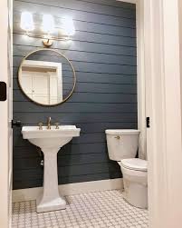 Powder room features an antique mirror behind a french pedestal sink. The Top 73 Small Powder Room Ideas Interior Home And Design