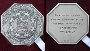 The fa community shield has been the traditional curtain raiser for the premier league season. Community Shield Medals Google Search Silver Shaped Like A 50p With A Circle Shield And England S 3 Community Shield Fa Community Shield Medals