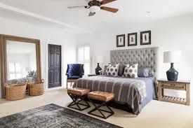 Get great deals on leather gray bed headboards. White Master Bedroom With Gray Headboard And Leather Stools Hgtv