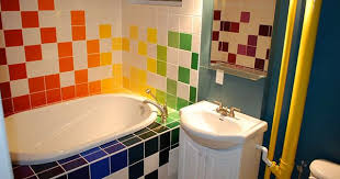 Lean into the organic aesthetic by topping your sage vanity with a wood mirror and by pulling in a couple of houseplants for good measure. 15 Lively Multi Colored Bathroom Designs Home Design Lover Colorful Bathroom Tile Childrens Bathroom Bathroom Decor Colors
