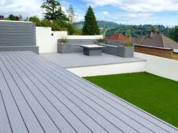 Cladco Light Grey Hollow Composite Decking Boards Are Used In This Garden Project Www Wpc Decking Co Uk Deck Garden Plastic Decking Composite Decking Pool