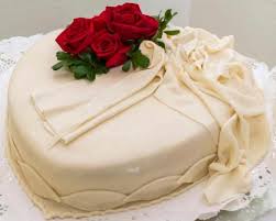 The traditional gift for a fiftieth anniversary is gold. Red Rose Wedding Cakes Lovetoknow