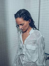 Imani is such a lovely water minx. Attractive Young Lady In White Wet Shirt Standing Under Water Spray In Shower Brunette Female Stock Photo 237452816
