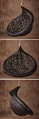 Cushions and pillows are a great way to inject print and color into your patio space. This Unique Hanging Chair Design Is Made From Black Volcanic Basalt Fibre