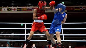 Several videos showed the residents in lovlina borgohain's village in golaghat district of assam jumping on the streets and bursting crackers in excitement. Nj06pxuilk Ubm