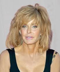 Farrah is gracing the cover of the fall 2013 edition of sophisticate's hair style guide magazine. Farrah Fawcett Medium Straight Hairstyle