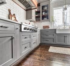 If you'd prefer to soften the look, consider choosing two cabinetry colors instead, placing the green shade on the base cabinets. Grey Kitchen Design Home Bunch Interior Design Ideas