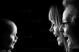 Again The Black Background And The Contrast With The Light On Their Faces This Is Unique B Family Studio Photography Studio Family Portraits Low Key Portraits