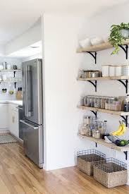To make it even more fun, give your kitchen a theme (like cats, in this case) to tie your keep your kitchen walls bare and wallpaper your breakfast nook to make the two spaces feel more separate. Redesigning A Small Kitchen Our 10 Best Tips For Remodeling My Kitchen Wallshoppe