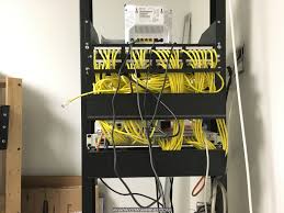 After mounting, reconnect the coaxial cable input and ethernet connection. Server Rack With Internet Modem And Switch Wall Mounted Tv Tv Installation Hdtv Antenna