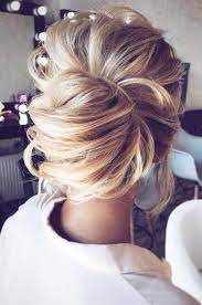 Modern Day Chignon Style Low Messy Bun Updo Beautiful Look For Any Special Occasion Hair Styles Long Hair Styles Wedding Hairstyles
